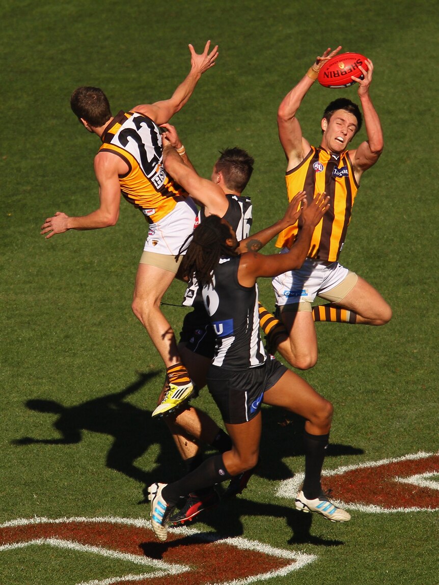 Hawthorn's Jack Gunston takes a great mark in the big game at the MCG against Collingwood.