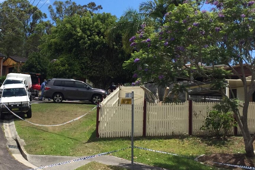 Alexandra Hills stabbing as the body of the deceased man is taken away by the coroner