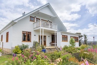 A house surrounded by a garden.