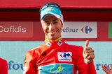 Fabio Aru claims the Vuelta Espana red jersey