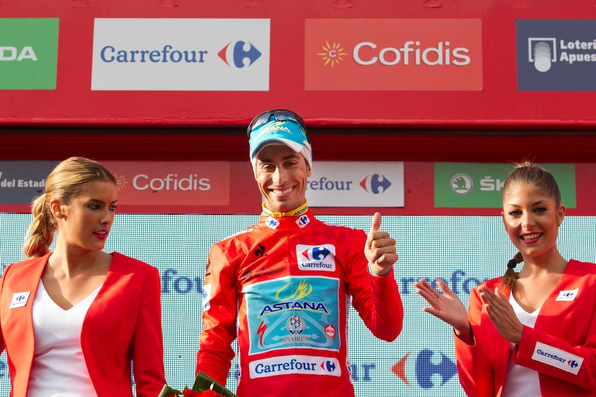 Fabio Aru claims the Vuelta Espana red jersey