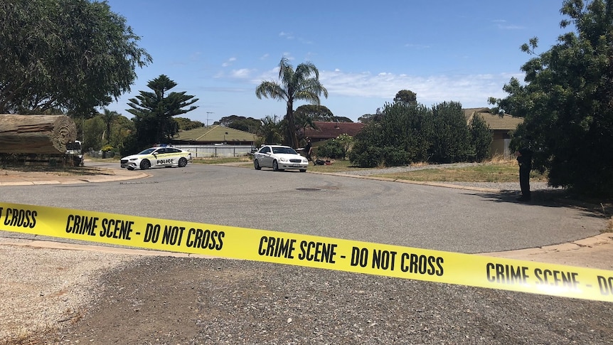 Crime scene tape in Nathan Court, Morphett Vale