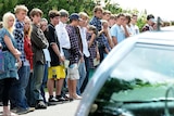 Friends gather at the funeral of Peter Edmonds