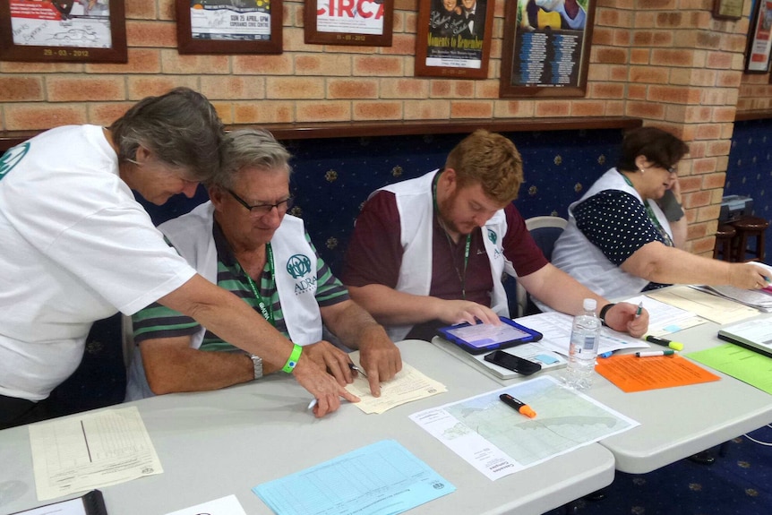 Volunteers at the Esperance Civic Centre organising accommodation.