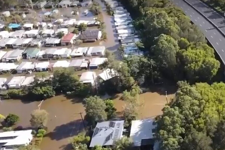 An aerial photo of a water-logged suburb.
