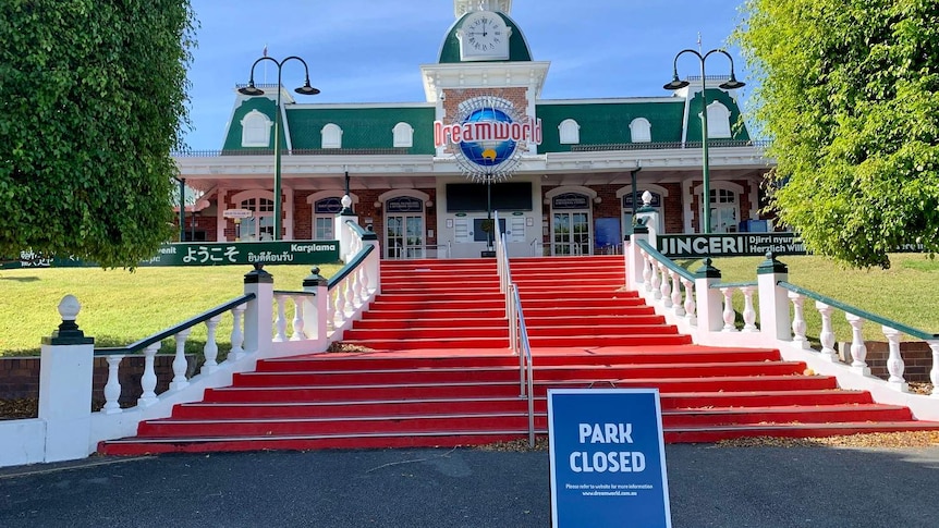 Front entrance to Dreamworld and empty stairs with 'park closed' sign at bottom.