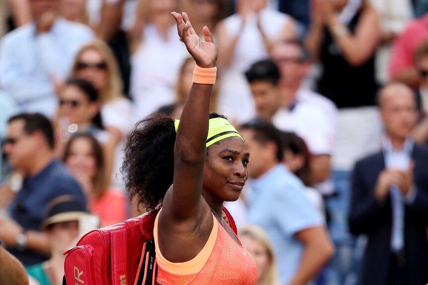Williams waves to the crowd at the US Open