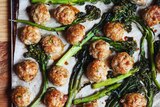 A tray of just baked pork meatballs and broccolini brushed with a sticky soy glaze, a midweek family dinner.