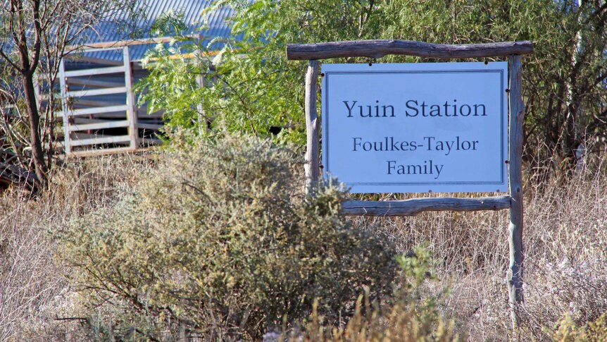 A sign for Yuin Station.