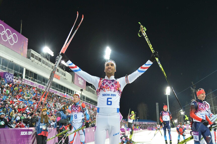 Martin Fourcade celebrates biathlon gold in Sochi