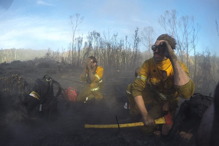 Tired and dirty firefighters at Gell River