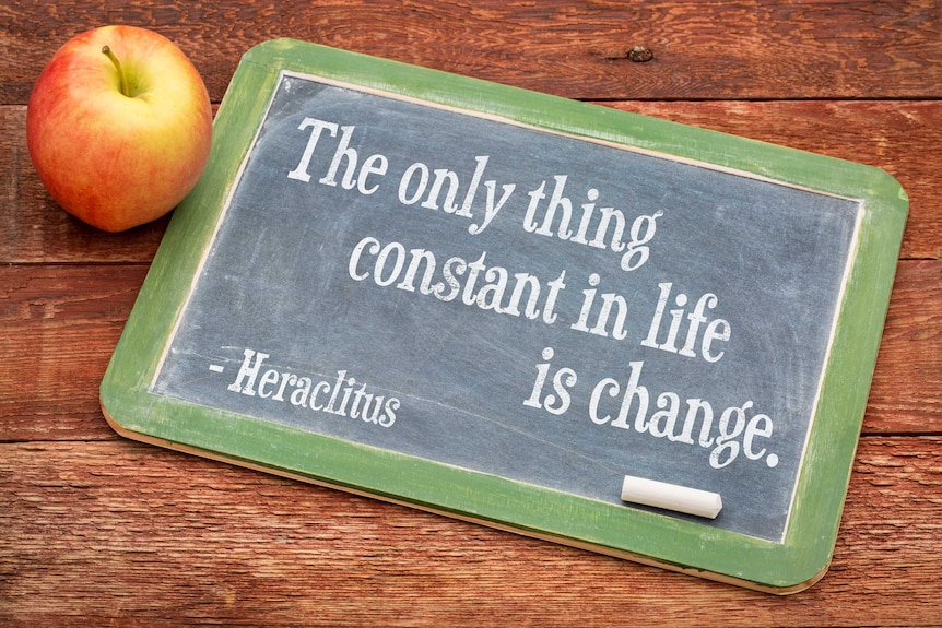 A blackboard with a Heraclitus quote: "The only thing constant in life is change."