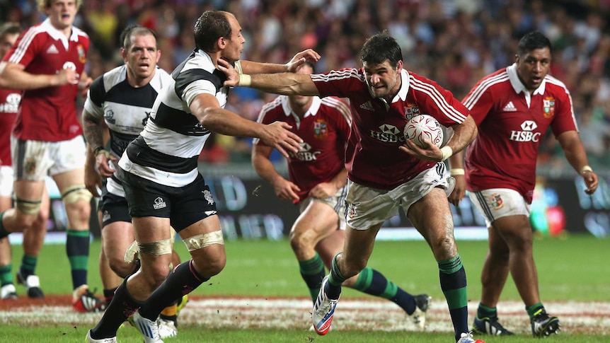 Mike Phillips scores for the Lions