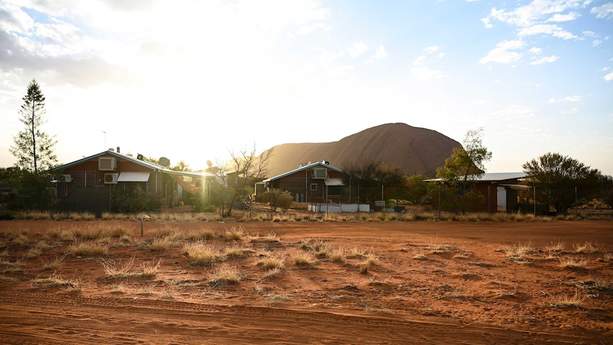 An Indigenous community at the base of Uluru