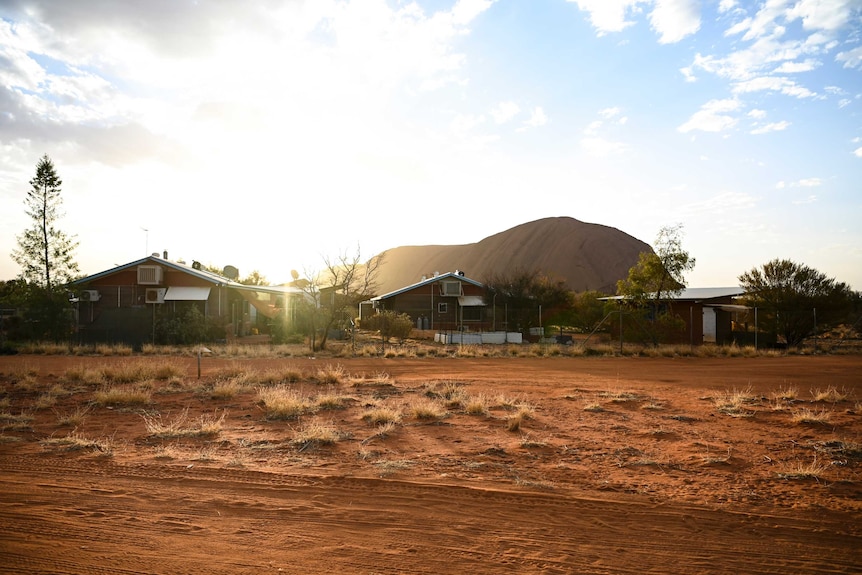 An Indigenous community at the base of Uluru