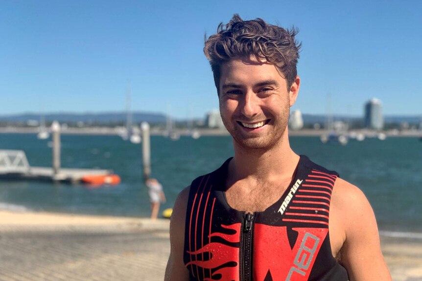 Smiling headshot of jet skier Dirk Dorren wearing a life jacket at The Spit boat ramp.