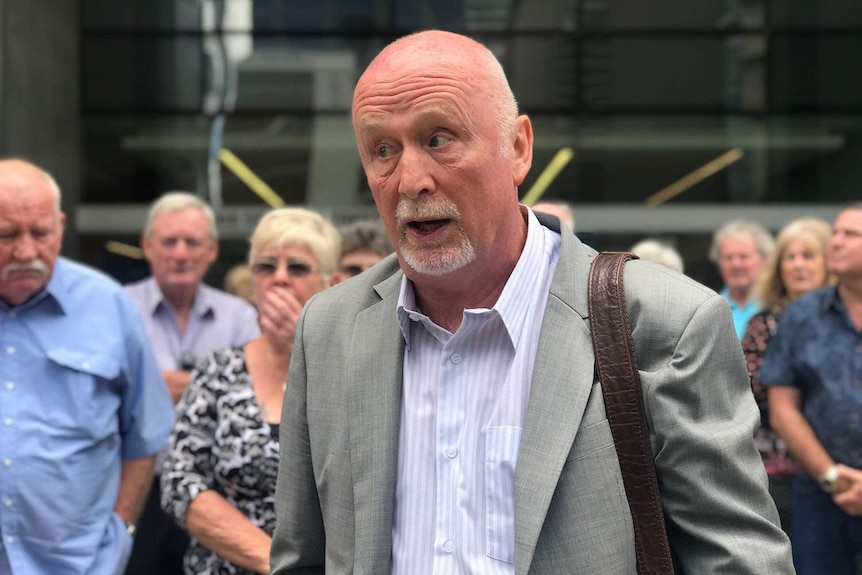 Nigel Jeffares speaks to the media outside the District Court in Brisbane on November 14, 2017.