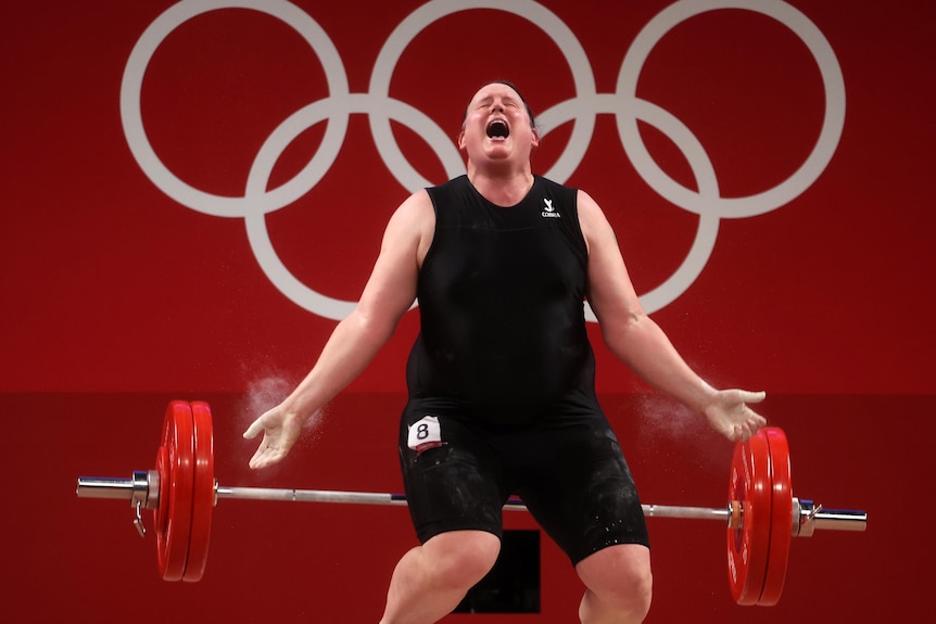 Laurel Hubbard drops weights behind her and screams.