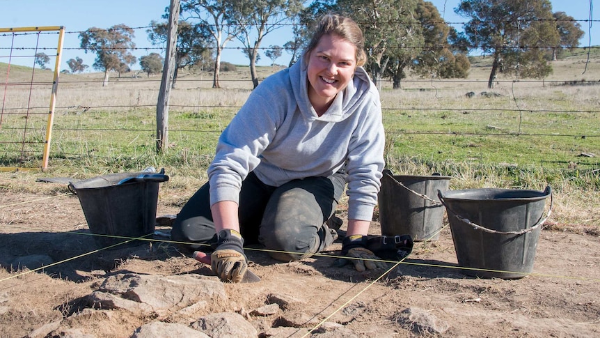 ANU archaeology masters student digging