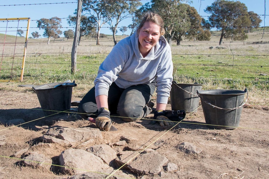 ANU archaeology masters student digging