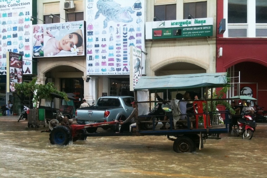 Car drives in Cambodian floods