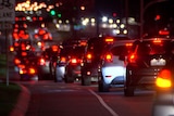 Car tail lights in the Melbourne electorate of La Trobe at night.