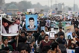 Pakistani relatives of schoolchildren killed in a Taliban attack a school in Peshawar protest