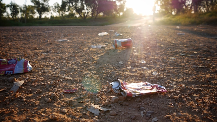 Crushed cans on the side of the road in Fitzroy Crossing WA, April 2022. 