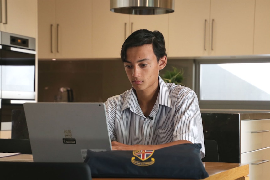 Seb Chandraratna working on a computer from home.