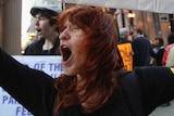 Joanna Pianko protests with Occupy Chicago outside the Federal Reserve Bank