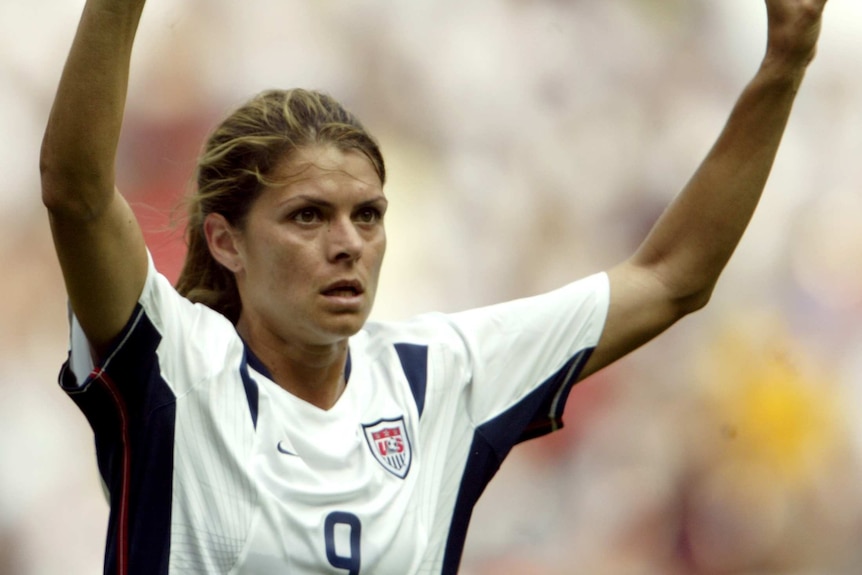 Mia Hamm celebrates a goal for USA