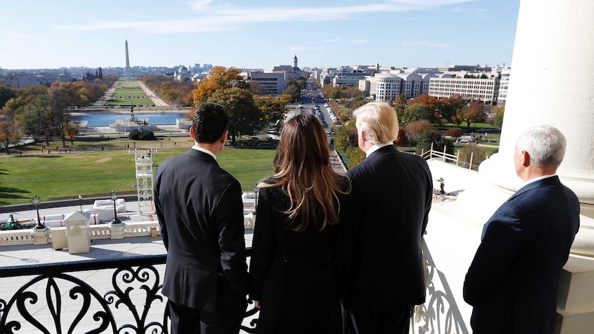 Paul Ryan shows Melania and Donald Trump the view from the Speaker's Balcony.