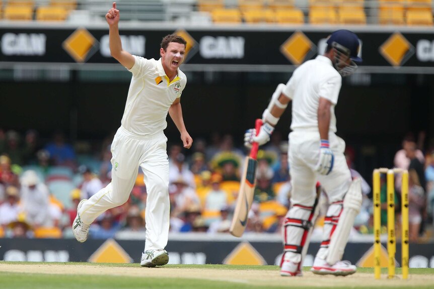 Josh Hazlewood celebrates the wicket of Ajinkya Rahane
