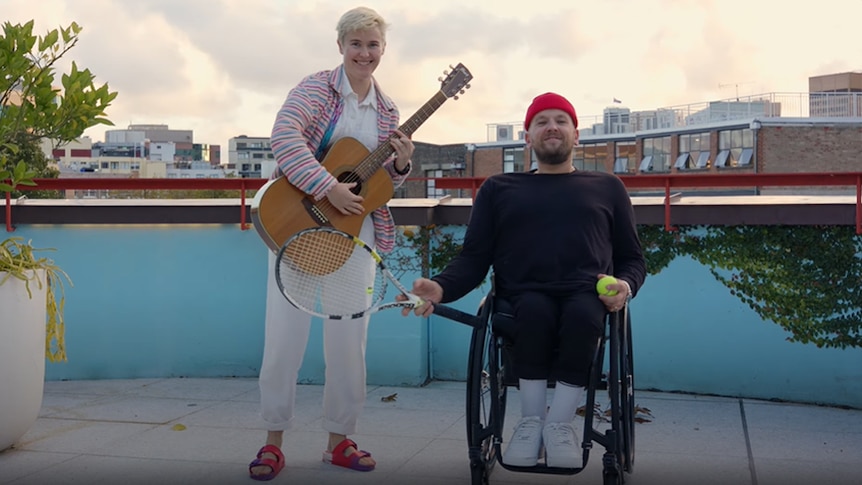 Alex The Astronaut and Dylan Alcott on a rooftop together