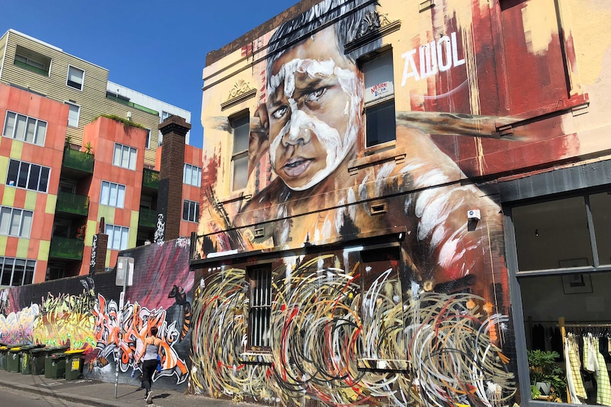 Street art on side of building in Fitzroy, Melbourne, of Indigenous boy