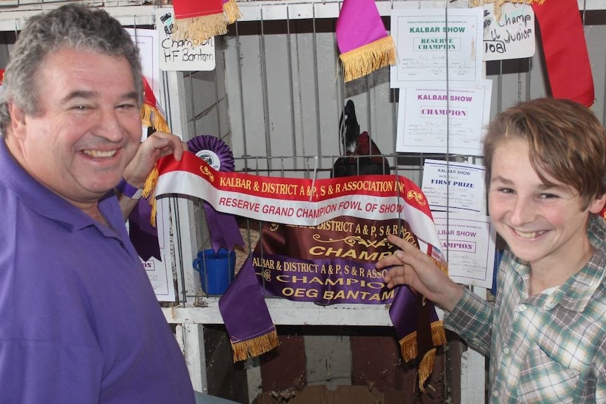 Peter and Lachie Arnett with ribbons