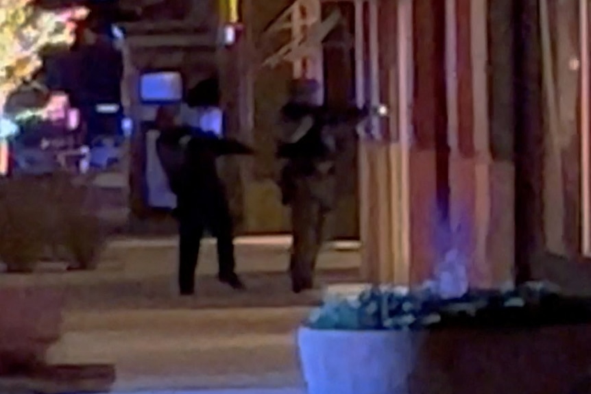 Armed police attend Denver shooting