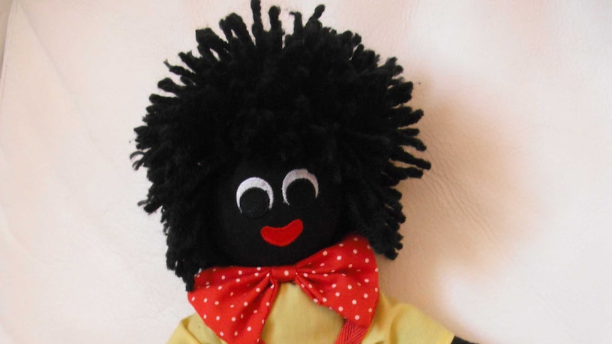 a photo of a toy gollywog doll