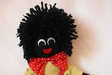 a photo of a toy gollywog doll