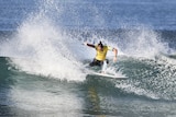 Tyler Wright surfing