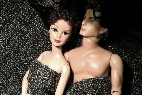 Barbie doll couple in bed