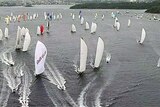 The fleet in the 2009 Sydney to Hobart yacht race takes off from Sydney Habour.