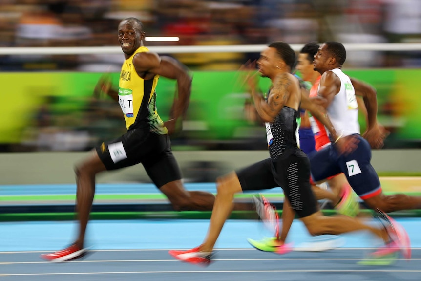 Usain Bolt races in men's 100 semis