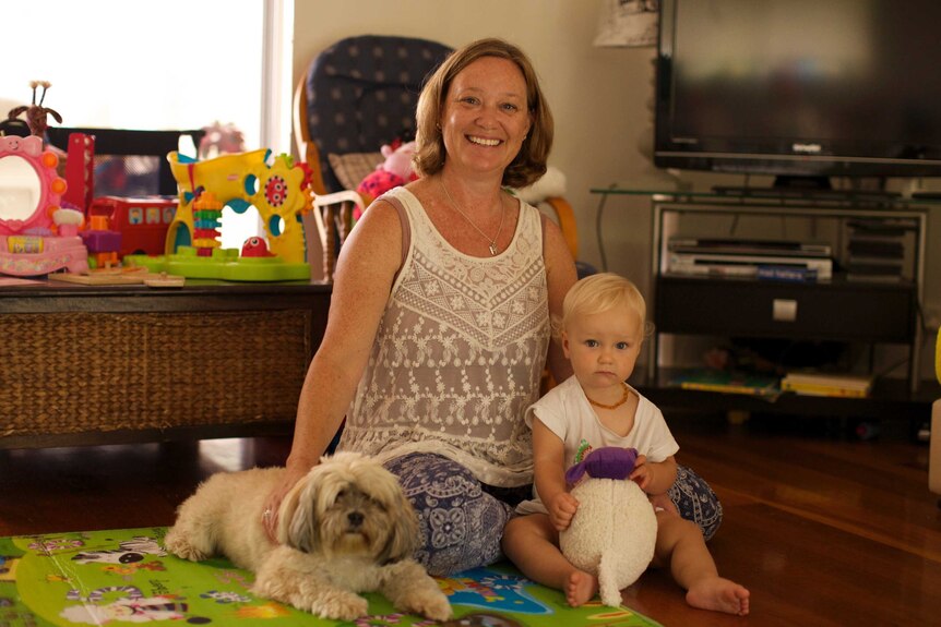 Sunshine Coast nurse Kristen Langford at home with her one-year-old daughter, January, 2015