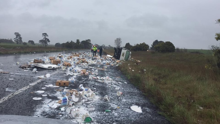 More than a ton of yoghurt spilled during a crash on the Federal Highway