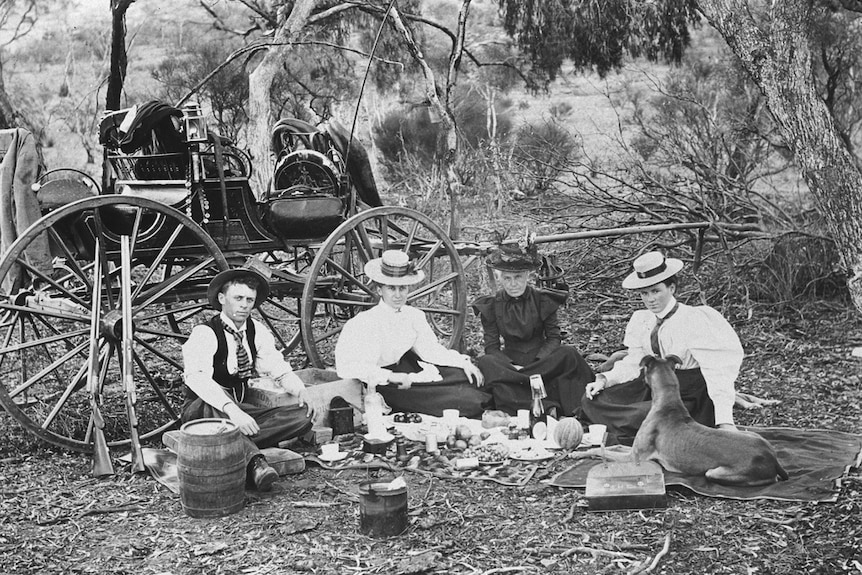 a group of people on a picnic in 1898