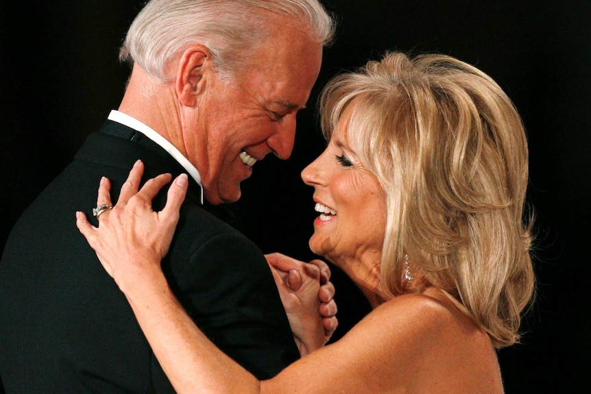 Joe Biden and Jill Biden smiling at each other while they dance