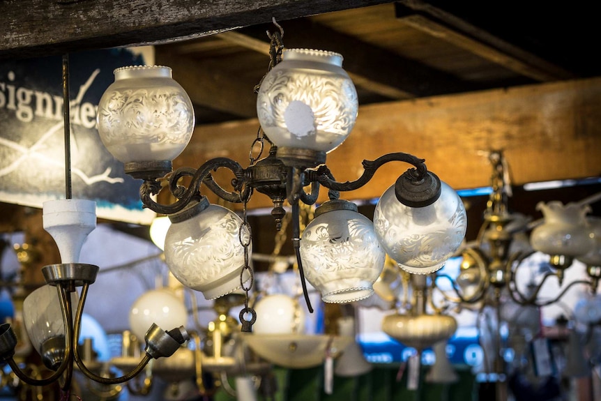 Household light fittings litter the ceiling of The Bower