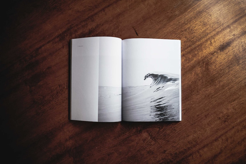 Open book with wave