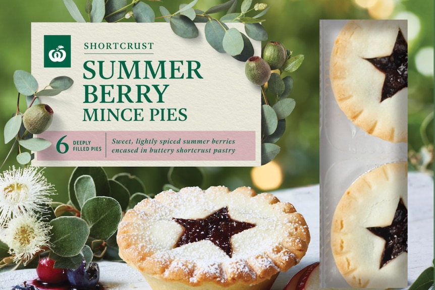 An advertisement for Woolworths mince pies that feature a star shape on the top.